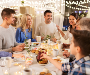 Family gathered around the dinner table for Advent reflections